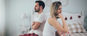 Couple having arguments and sexual problems in bed