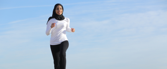 Arab saudi emirates woman running on the beach
