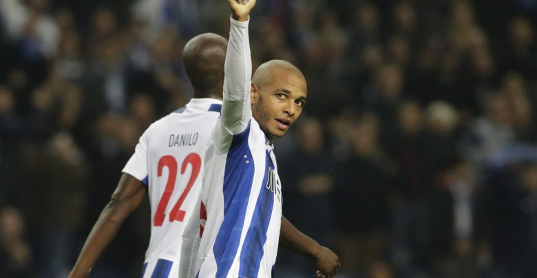 FC Porto’s Yacine Brahimi celebrates scoring their third goal with team mates